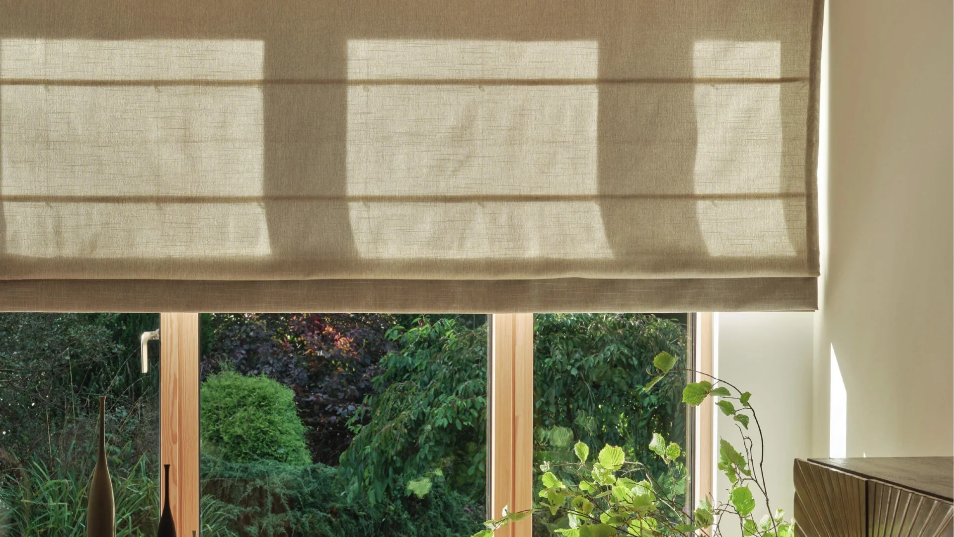 Linen Roman blind in golden evening light
