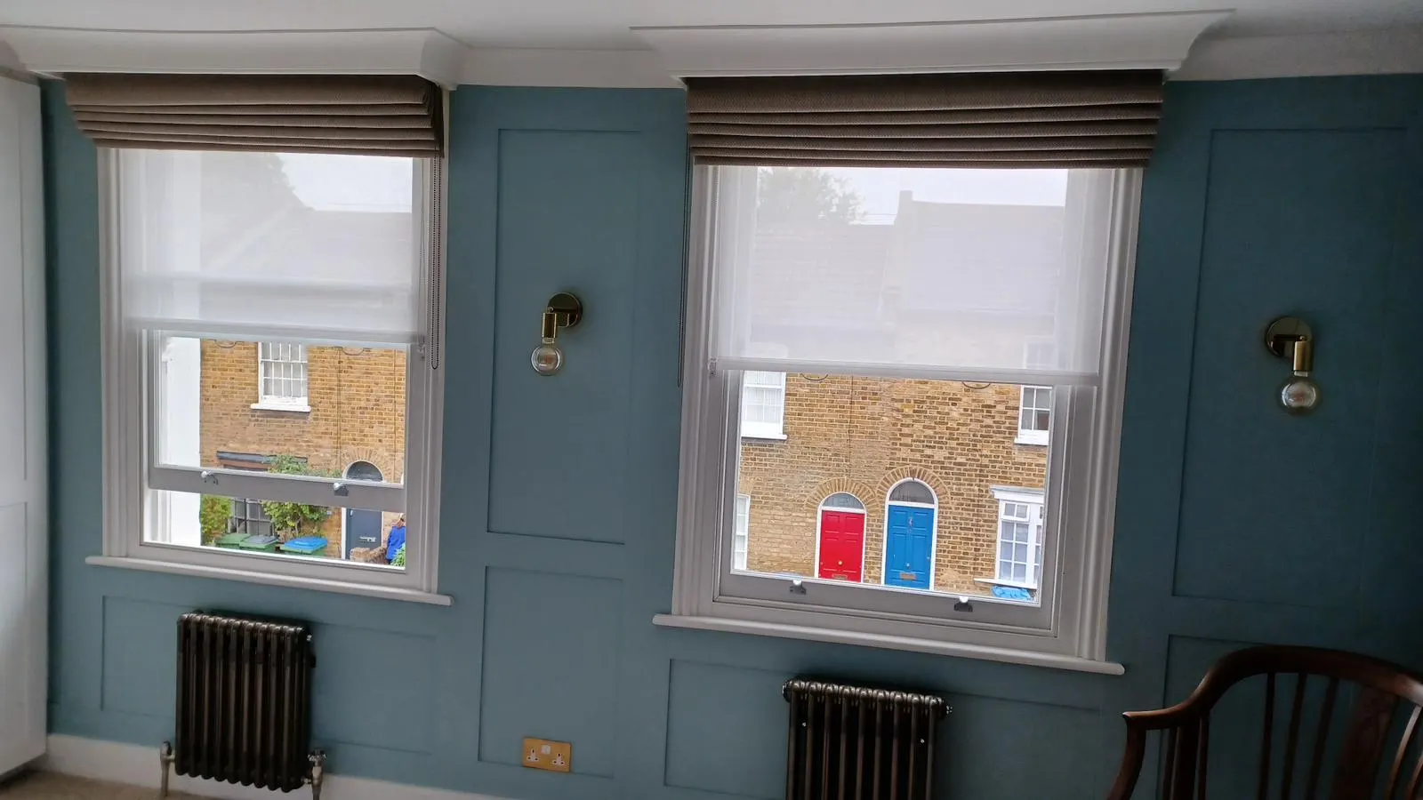 Roman blinds with sheer voile rollers