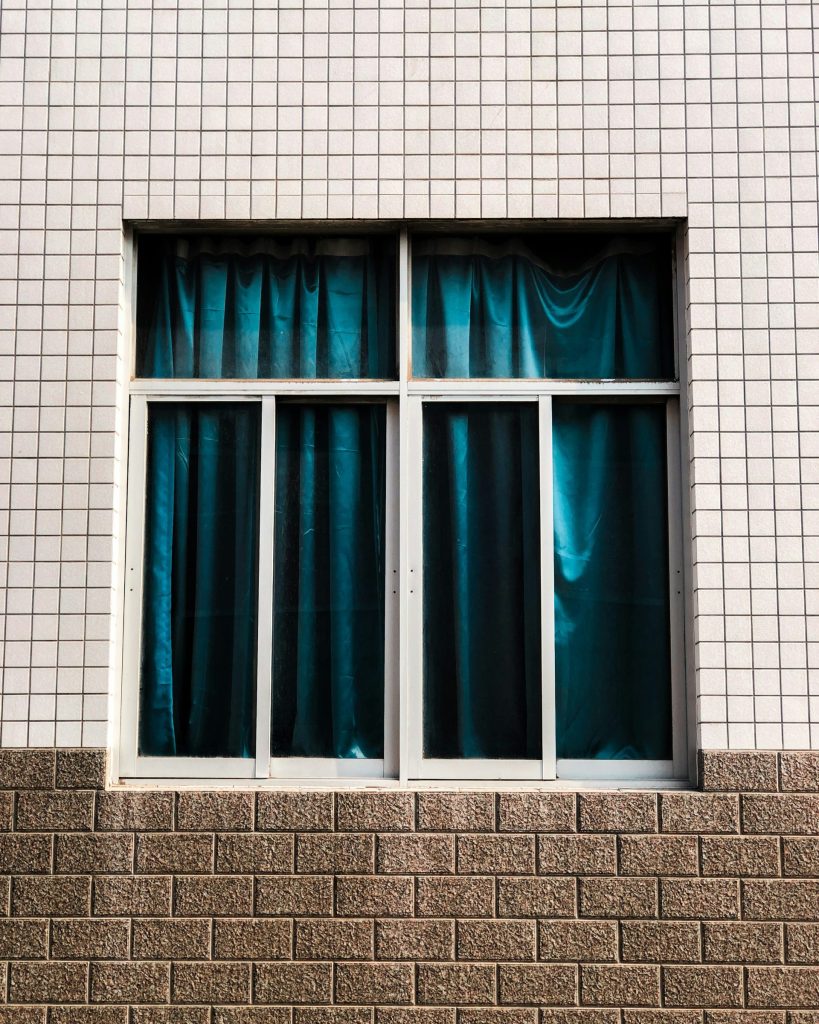 white wooden framed glass window